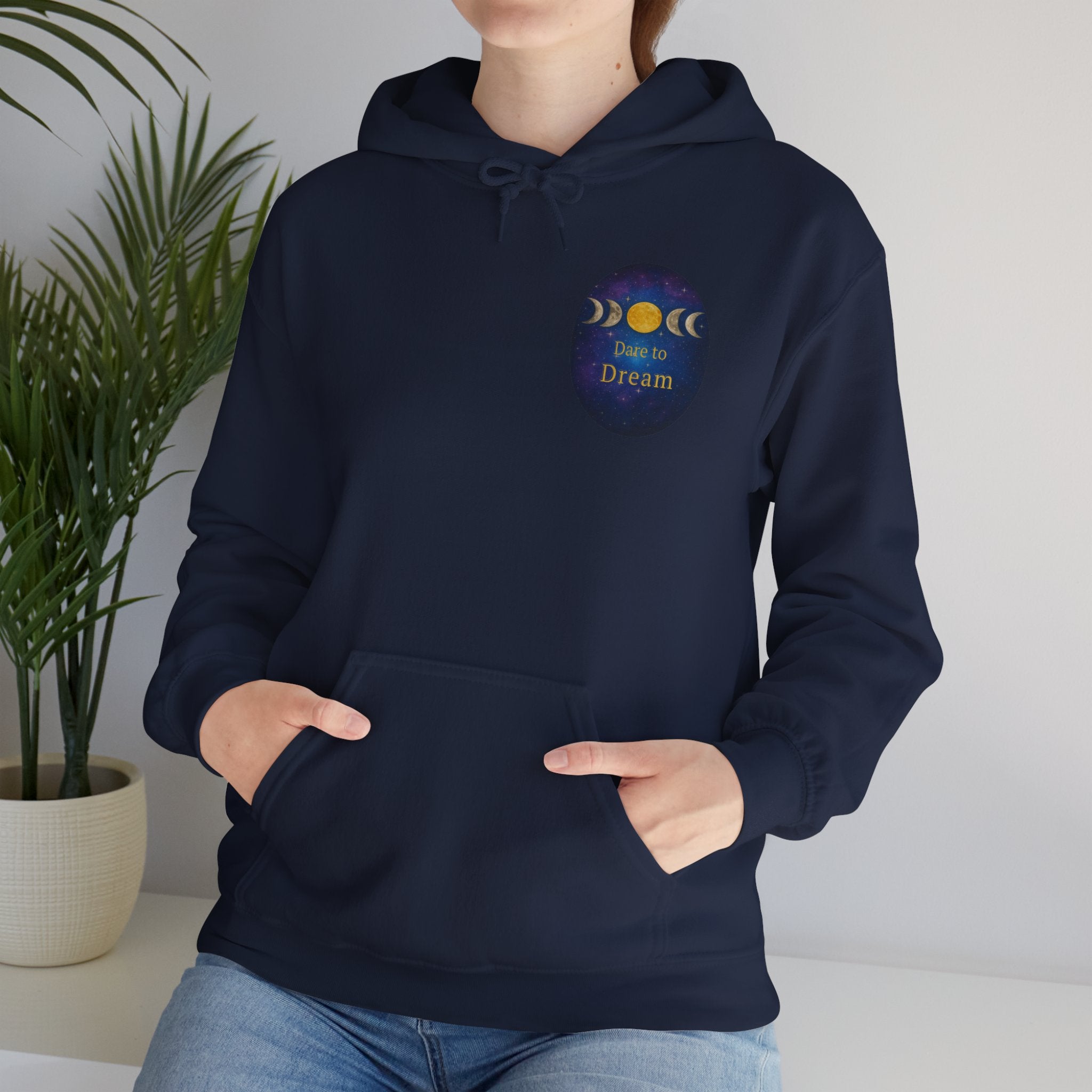 Dare to Dream Moon-Phase Hoodie | Back Glow Print + Front Badge | Heavy Blend™, Inspirational and Motivational Apparel, Gift for Dreamers, Creative Expression Wear