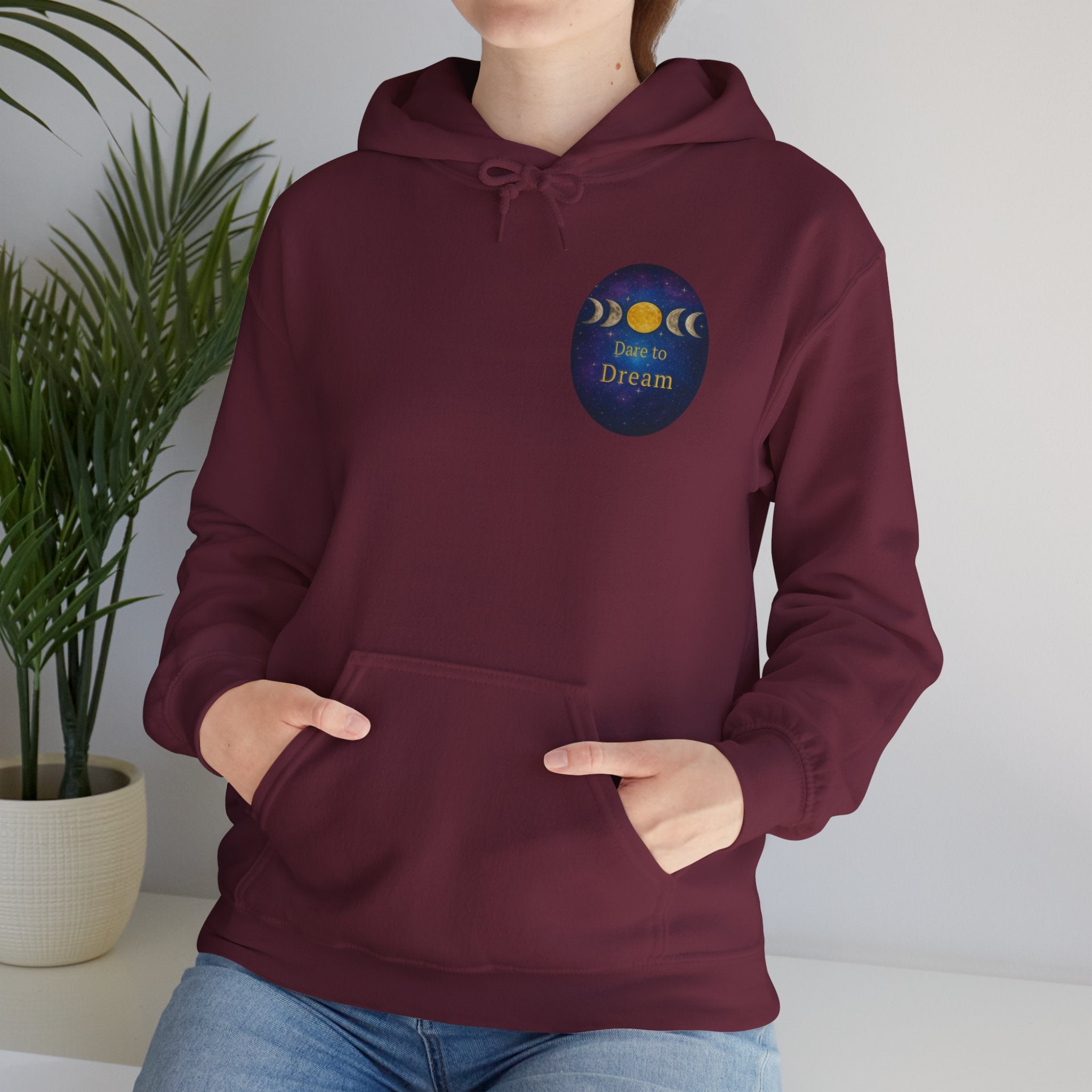 Dare to Dream Moon-Phase Hoodie | Back Glow Print + Front Badge | Heavy Blend™, Inspirational and Motivational Apparel, Gift for Dreamers, Creative Expression Wear