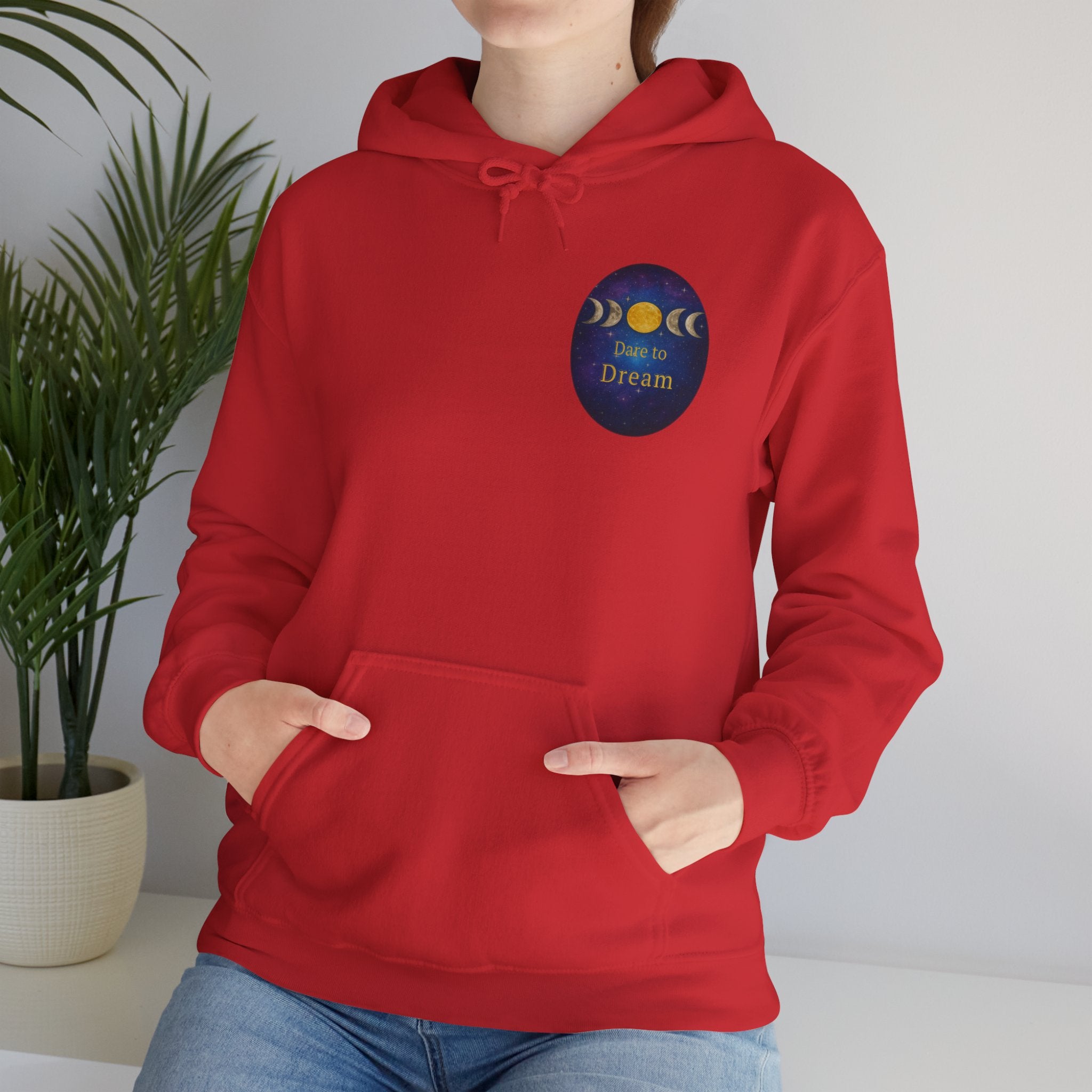 Dare to Dream Moon-Phase Hoodie | Back Glow Print + Front Badge | Heavy Blend™, Inspirational and Motivational Apparel, Gift for Dreamers, Creative Expression Wear