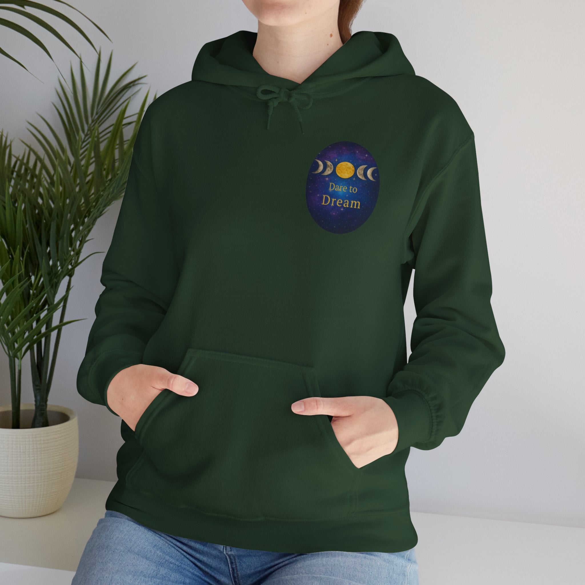Dare to Dream Moon-Phase Hoodie | Back Glow Print + Front Badge | Heavy Blend™, Inspirational and Motivational Apparel, Gift for Dreamers, Creative Expression Wear