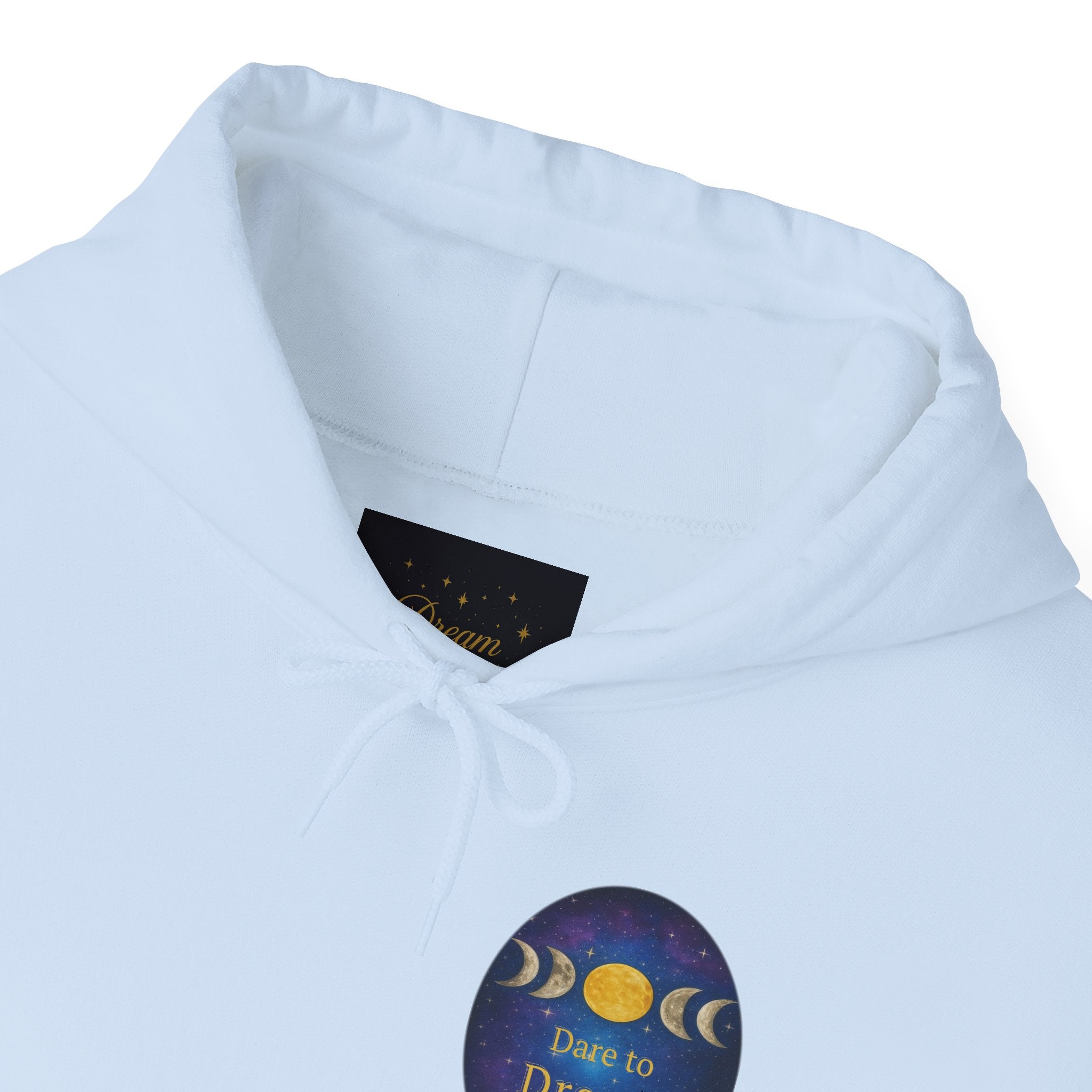 Dare to Dream Moon-Phase Hoodie | Back Glow Print + Front Badge | Heavy Blend™, Inspirational and Motivational Apparel, Gift for Dreamers, Creative Expression Wear