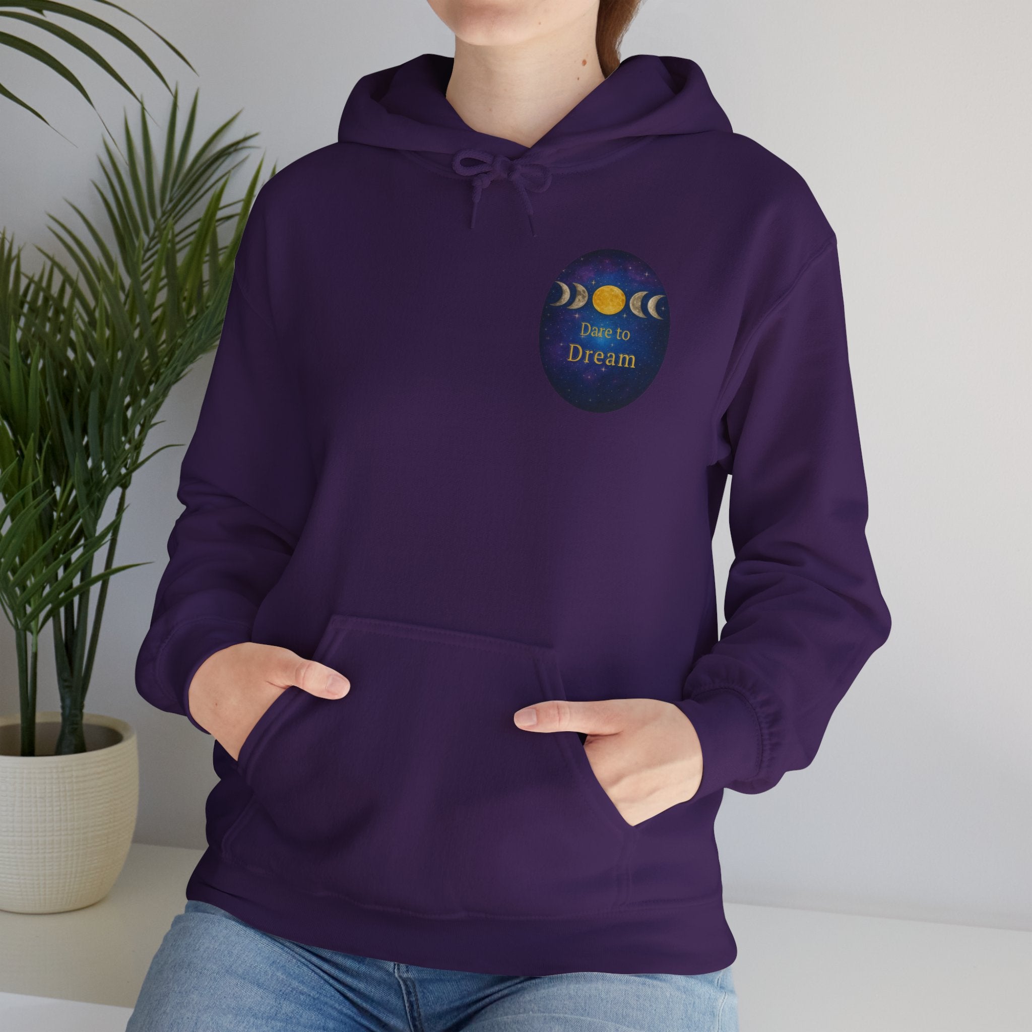 Dare to Dream Moon-Phase Hoodie | Back Glow Print + Front Badge | Heavy Blend™, Inspirational and Motivational Apparel, Gift for Dreamers, Creative Expression Wear