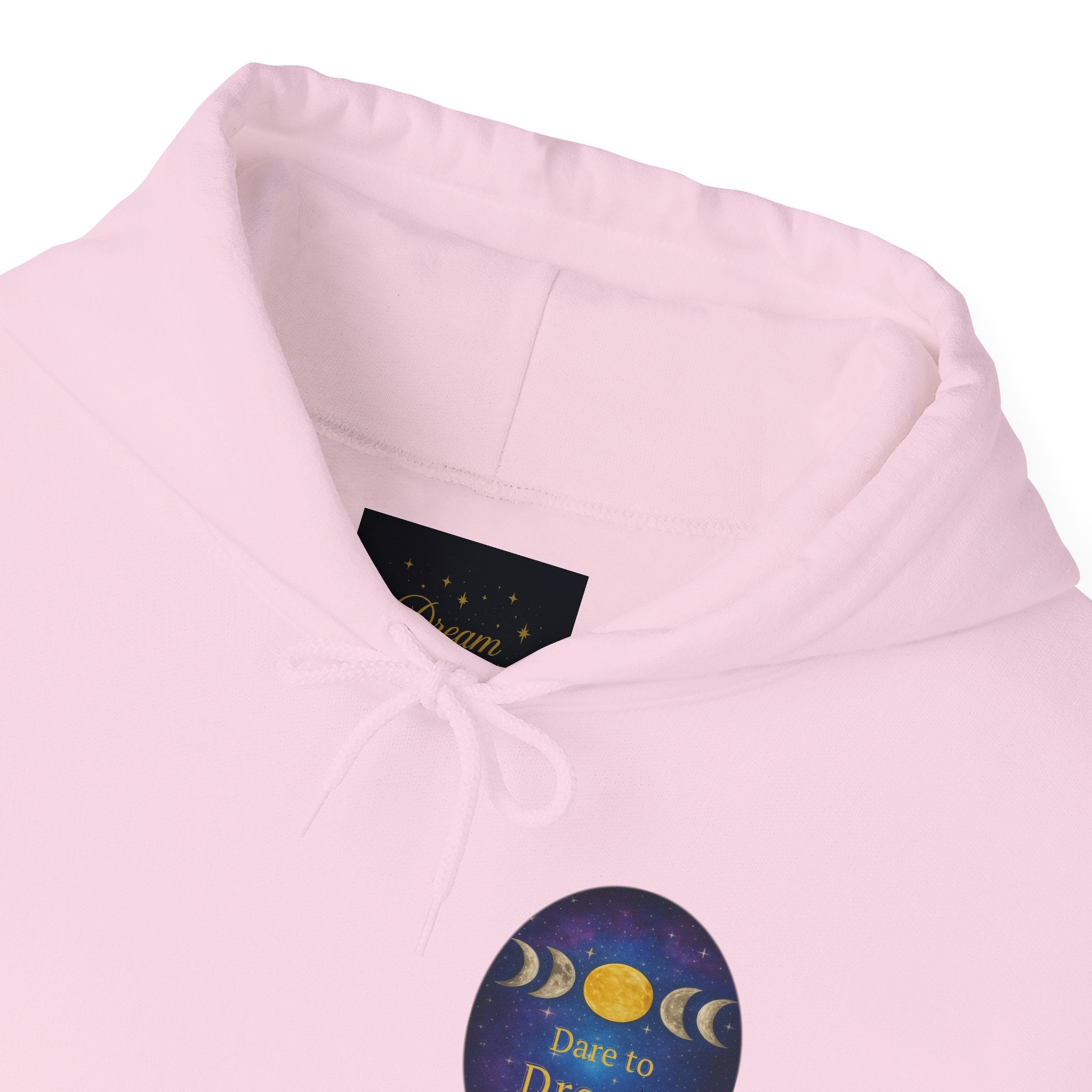 Dare to Dream Moon-Phase Hoodie | Back Glow Print + Front Badge | Heavy Blend™, Inspirational and Motivational Apparel, Gift for Dreamers, Creative Expression Wear
